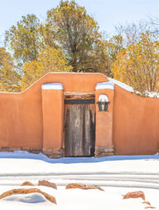 Serene-looking Santa Fe adobe wall and door, lightly covered with a dusting of early snow. If you're extra sensitive to other people, overwhelmed by too much stimulation, can't handle too many people at once, you may be an HSP. The Santa Fe Therapist can help you understand your beautiful sensitivity and teach you how to protect yourself. You can thrive as a highly sensitive person. Online counseling in Santa Fe and throughout New Mexico. 87506, 87508, 87505